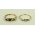 An Edwardian 18ct gold ring, set with three sapphires divided by two diamonds, size M/N, and an 18ct... 