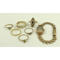 A lady's 1930s gold tank wristwatch, three various 9ct gold rings, size M, N & Q, and three further ... 