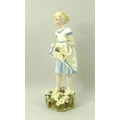 A Royal Worcester figure 'The First Cuckoo', modelled by F G Doughty, shape number 3082, puce printe... 