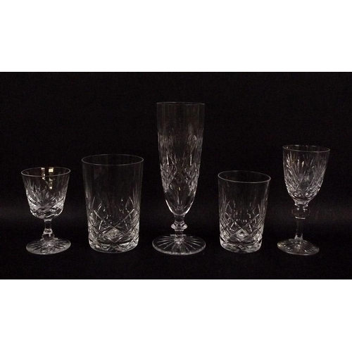 504A - A collection of Edinburgh Crystal tableware, late 20th century, comprising eight champagne flutes, 1... 