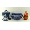 A Wedgwood blue biscuit barrel, circa 1900, 18cm, a Shelley pear shaped vase, in orange ground paint... 