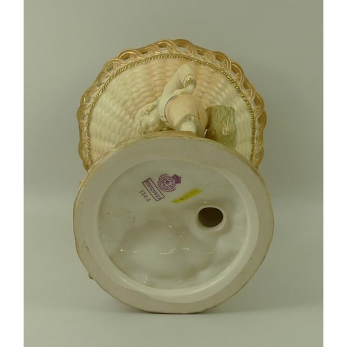 508A - A Royal Worcester blush ivory porcelain centre piece, circa 1891, the basket weave top, above natura... 