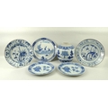 A group of five Chinese underglaze cobalt blue plates, circa 1780, one decorated with five boys play... 