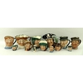 A collection of Royal Doulton character jugs, between 4 and 10cm, comprising 'Long John Silver', 'Fa... 