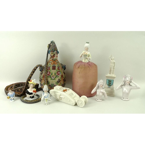 516 - A porcelain pin cushion doll, and five further similar, a Victoria China, JR & Co mottoware 'Model o... 