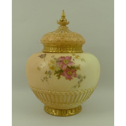 517A - A Royal Worcester blush ivory porcelain pot pourri, painted with flowers, gilded highlights througho... 