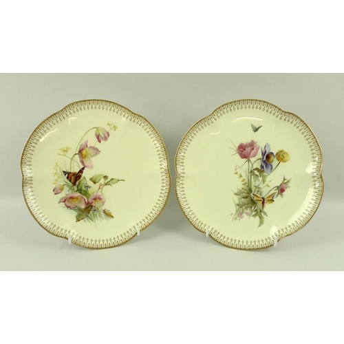 525 - A pair of Royal Worcester cabinet plates, signed and painted by Edward Raby, decorated with flowers ... 
