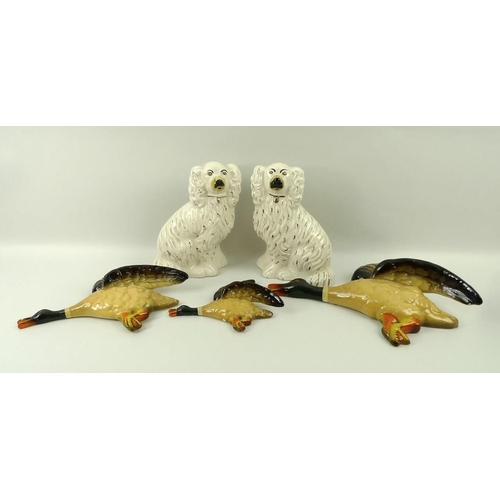 529 - A pair of Staffordshire flatbacks of King Charles Spaniels, L & Sons, Hanley, 19cm, together with th... 
