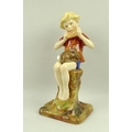 A Royal Worcester figurine 'Peter Pan', modelled by F Gertner, shape number 3011, in red colourway, ... 