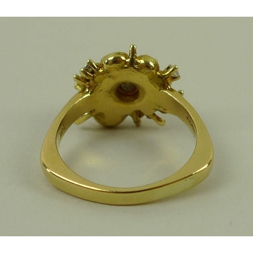 800 - An 18ct gold, diamond and enamel dress ring, in the form of a buttercup, the central diamond of appr... 