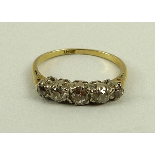 804 - An 18ct gold and diamond five stone ring, 0.5ct total approximate diamond weight, size M, 2.2g.