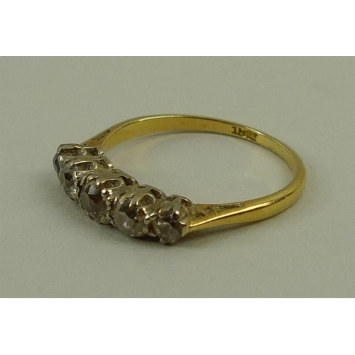 804 - An 18ct gold and diamond five stone ring, 0.5ct total approximate diamond weight, size M, 2.2g.