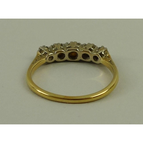 804 - An 18ct gold and diamond five stone ring, 0.5ct total approximate diamond weight, size M, 2.2g.