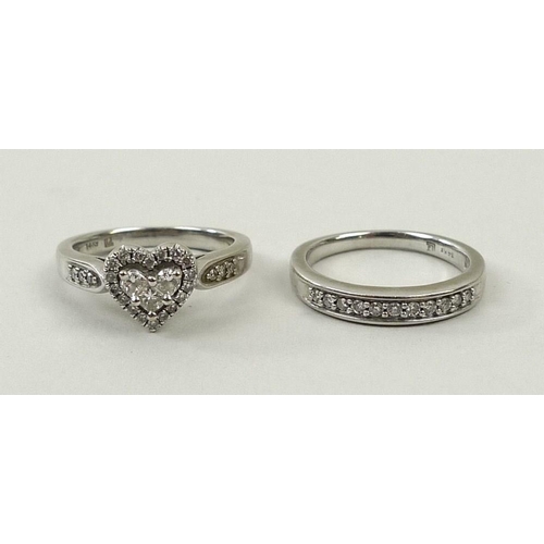 810 - A 14kt white gold half eternity ring, set with eleven diamonds, and a matching 14kt and diamond ring... 