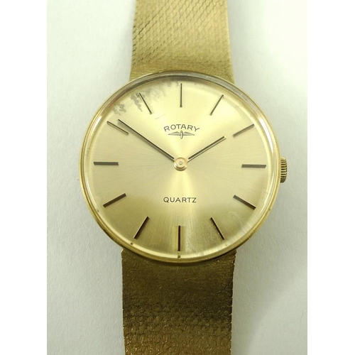 813 - A gentleman's Rotary 9ct golf wristwatch, the circular face with baton numerals, with textured gold ... 