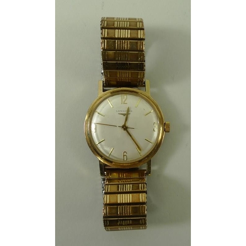 816 - A Longines 1950s gentleman's wristwatch, the silvered face with baton numerals, and Arabic numerals ... 