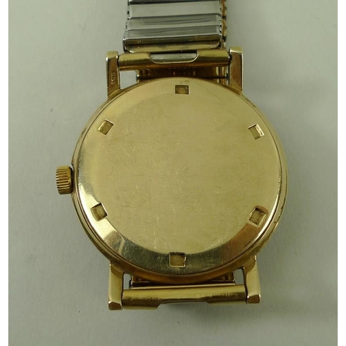 816 - A Longines 1950s gentleman's wristwatch, the silvered face with baton numerals, and Arabic numerals ... 