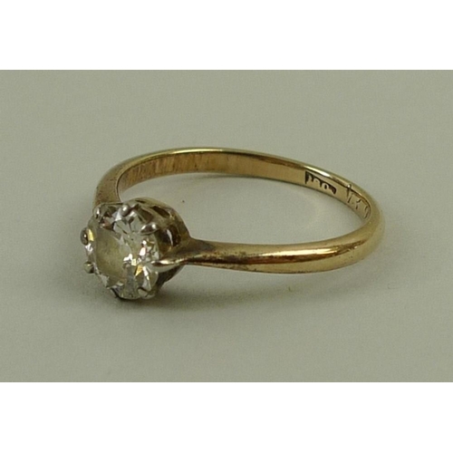 818 - An 18ct gold and diamond solitaire ring, the diamond approximately 0.8ct, size M, 2g total weight.