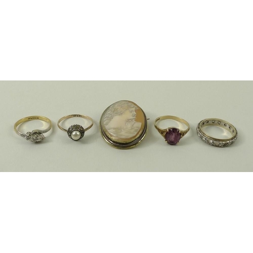 819 - A 1930s 18ct gold ring, the three stones illusion set in platinum, size P, a 9ct gold and amethyst d... 