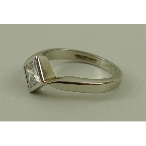 820 - A solitaire diamond ring, princess cut, on a platinum 950 band, colour F, 0.68ct, size L, 4.8g, with... 