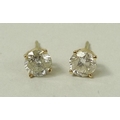 A pair of 14ct gold and diamond ear studs, the brilliant cut diamonds each of approximately 0.5ct, 1... 