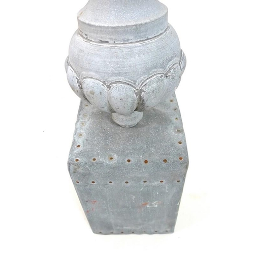 835 - A vintage weather vane finial, in fragment zinc and tin, urn shaped with four leaf flowers, on recta... 