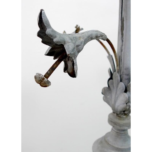 835 - A vintage weather vane finial, in fragment zinc and tin, urn shaped with four leaf flowers, on recta... 