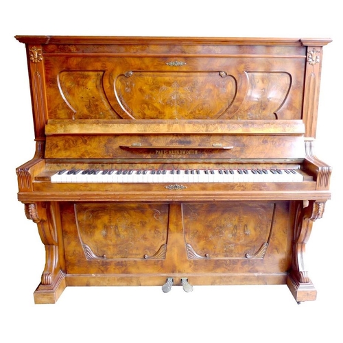 841 - A late 19th century German walnut upright piano, by Paul Klindworth, Berlin, the case richly decorat... 