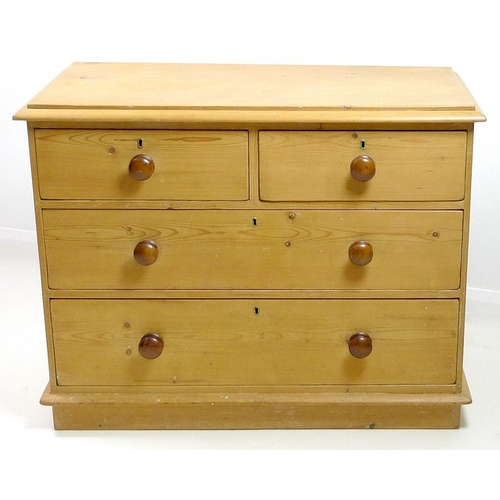 844 - A Victorian pine chest of two short over two long drawers, with later contrasting turned handles, ra... 