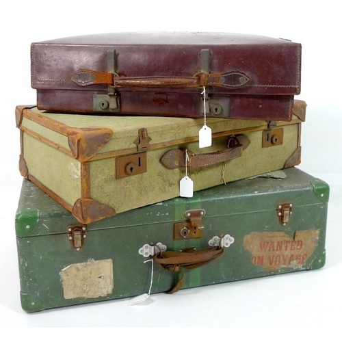 850 - A group of three vintage suitcases, comprising a tin suitcase, a leather case and a linen case with ... 