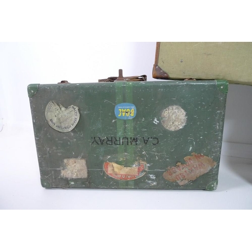 850 - A group of three vintage suitcases, comprising a tin suitcase, a leather case and a linen case with ... 