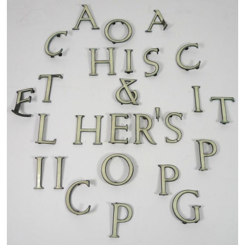 854 - A collection of enamel and bronze shop sign letters, early 20th century, cream enamel, 15cm. (27)