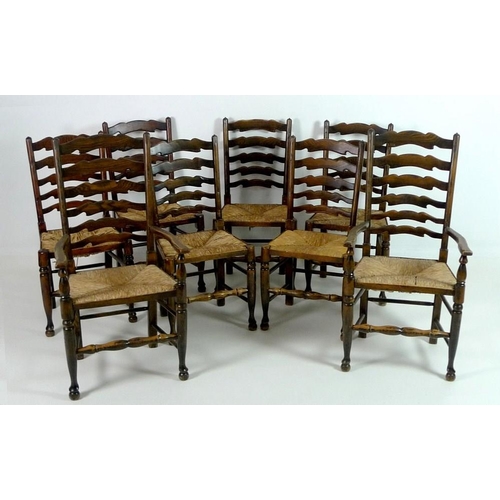 861 - A set of eight country ladderback dining chairs, late 20th century, with rush seats and turned legs ... 