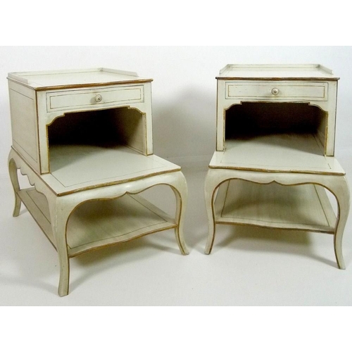 901 - A pair of Colefax and Fowler bedside tables, circa 1970, with three quarter gallery and serpentine f... 