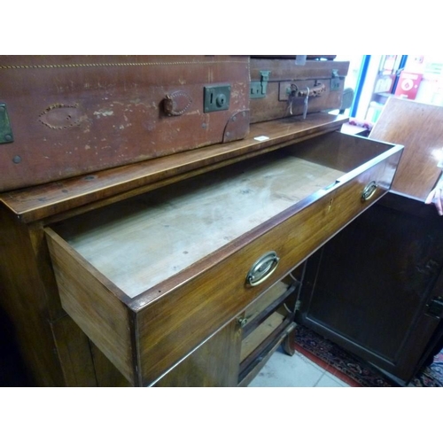 902 - A Regency mahogany and line inlaid linen press, the single drawer above two doors with oval line inl... 