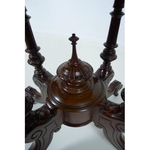 907 - A Victorian burr walnut loo table, with oval tilt top burr walnut surface, deeply moulded edge, rais... 