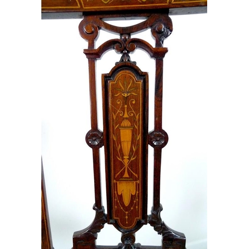 909 - Four Edwardian mahogany and marquetry inlaid salon chairs, the pierced splats intricately formed wit... 