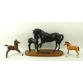 A Beswick figure of Black Beauty and foal, on a wooden base, 21cm, a gloss brown foal, and a light t... 