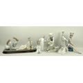 A collection of Lladro figurines, comprising a young woman with a goose and a dog, 27cm, a girl stre... 