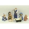 A Hummel Nativity set of seven pieces comprising Joseph, 17cm, Mary, 10cm, baby Jesus in crib, a she... 