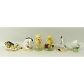 A collection of Royal Doulton Winnie the Pooh figurines, comprising Pooh Counting the Honeypots, WP1... 