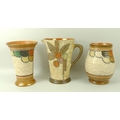 A group of three Crown Ducal ceramics, by Charlotte Rhead, comprising a jug in the patchwork design,... 