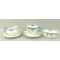 An Aynsley bachelors tea set, decorated with blue flowers, with moulded handles, comprising tea cup ... 