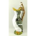 A William Brownfield majolica jug, 1876, in the form of an bird with open mouth, with a monkey atop ... 