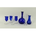 A group of miniature dolls house glassware, 18th century, comprising a blue glass bottle vase, 7cm, ... 