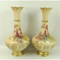 A pair of Royal Worcester blush ivory vases with flared rims, gold highlighted beaded collar and flu... 