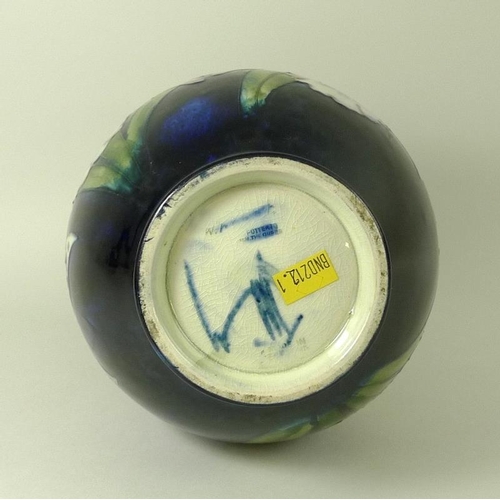 501 - A Moorcroft vase, of ovoid form with cylindrical neck, in the Iris pattern, signed to base in under ... 