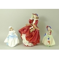 A group of Royal Doulton figurines comprising Top O' The Hill HN1834, Dinky Do HN3618, and Babie HN1... 