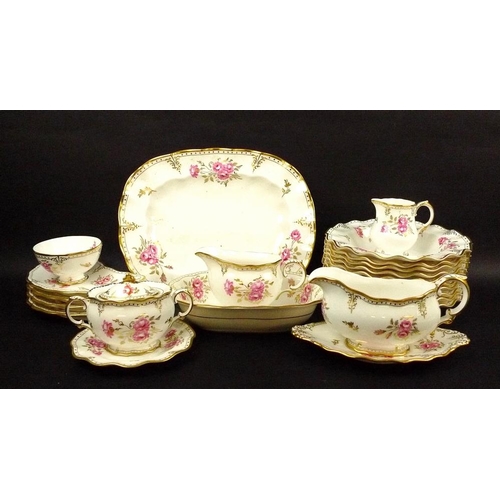 544 - A Royal Crown Derby part dinner service, in the 'Royal Pinxton Roses' pattern, XLVIII, early 1980s, ... 