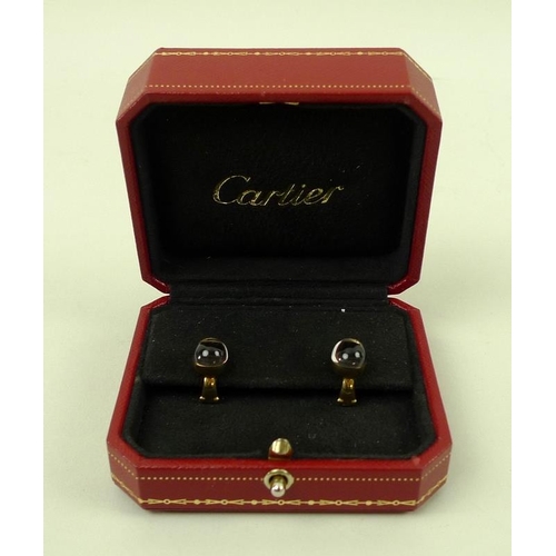 856 - A pair of Cartier 18ct gold and diamond earrings, the diamonds pave set under a teardrop cabochon cr... 